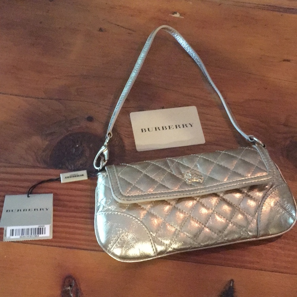 Burberry gold metallic clutch